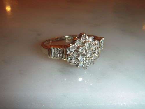 A fine 9ct Vintage 0.50 Carat Diamond cluster ring