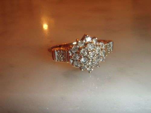 A fine 9ct Vintage 0.50 Carat Diamond cluster ring