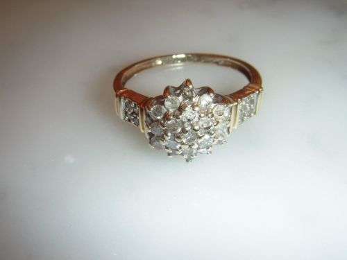 A fine 9ct Vintage 0.50 Carat Diamond cluster ring