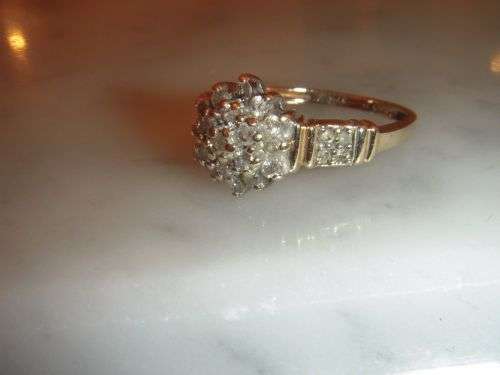A fine 9ct Vintage 0.50 Carat Diamond cluster ring
