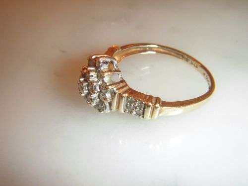 A fine 9ct Vintage 0.50 Carat Diamond cluster ring