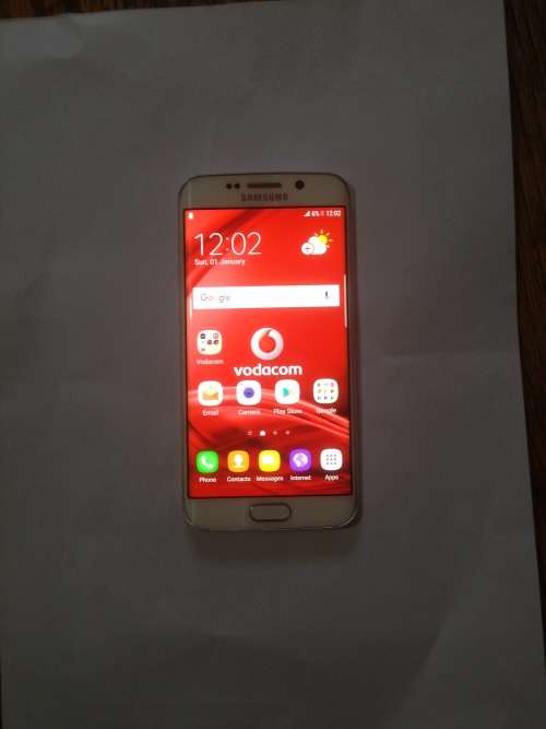 Samsung S6 edge 64gb in good condition in original box and charger