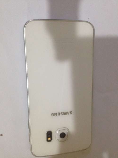 Samsung S6 edge 64gb in good condition in original box and charger