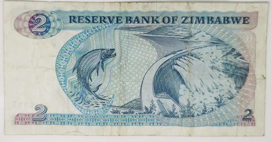 1983 | 2 Dollars | Zimbabwe | 134 x 69 mm | Signature: 2 | "Chiremba Rocks" Issued Note