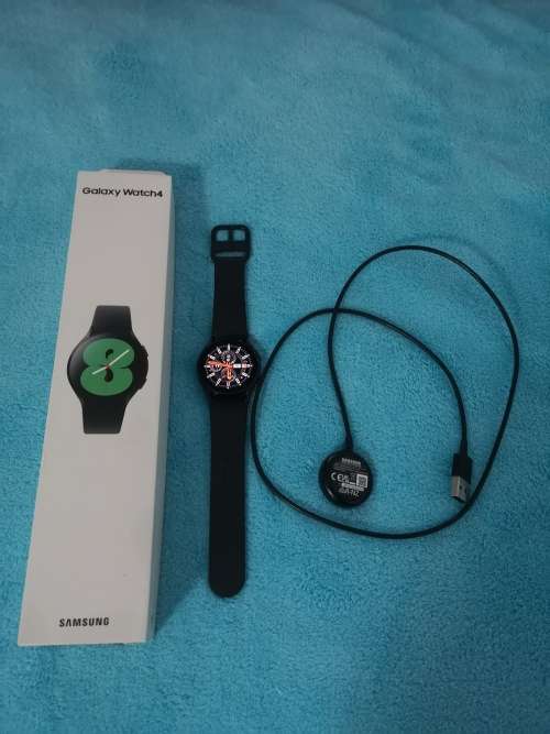 Samsung Watch 4 in its original box with warranty