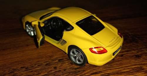 Porsche Cayman S   Die Cast Model Scale  1/36 -  WELLY Quantity Discount on Selling