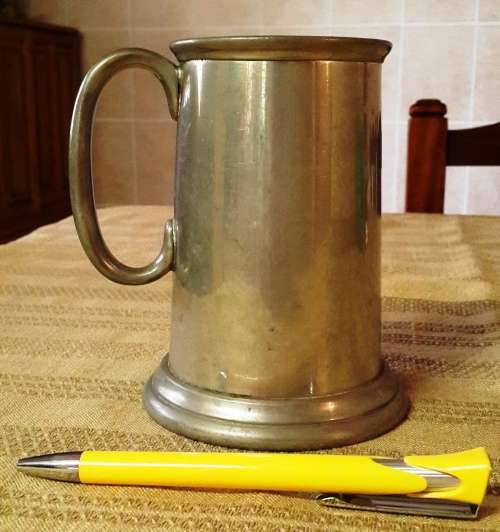 PEWTER TANKARD. Bit dented and unpolished.