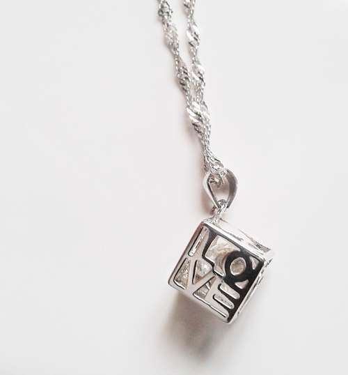 Cubic Zirconia inside a Platinum Plated Square Box Pendant with Chain