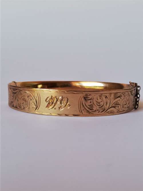 Vintage 9ct Gold hinged bangle with safety chain
