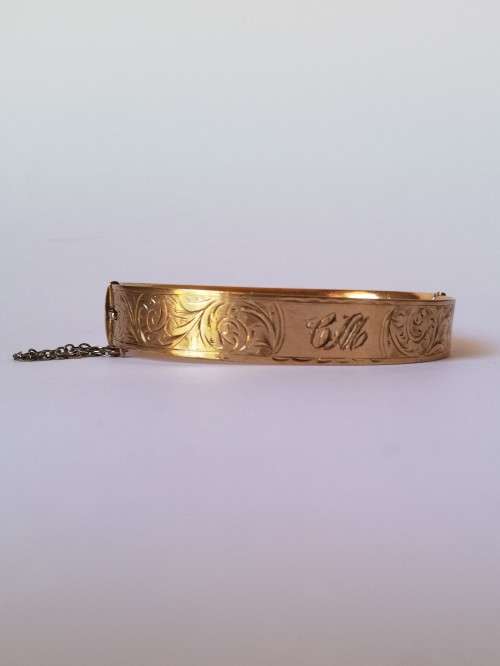 Vintage 9ct Gold hinged bangle with safety chain