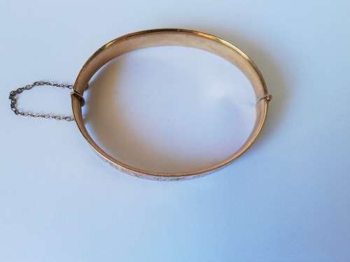 Vintage 9ct Gold hinged bangle with safety chain