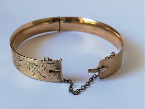 Vintage 9ct Gold hinged bangle with safety chain