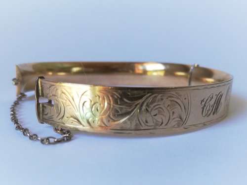 Vintage 9ct Gold hinged bangle with safety chain