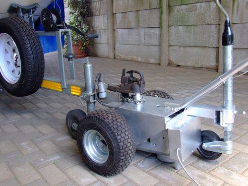Mini electric tractor with tow hitch