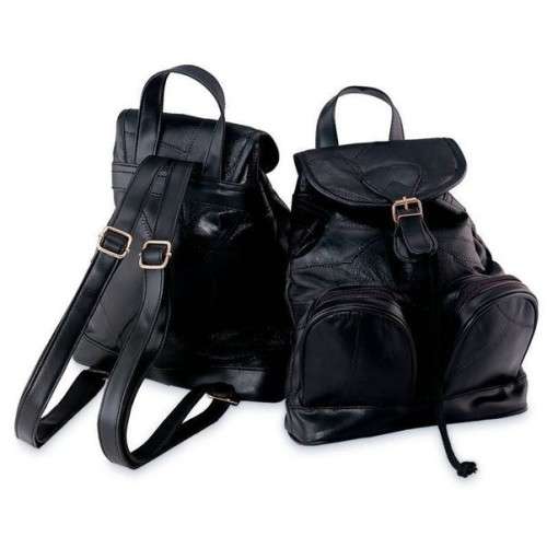 LADIES PATCH HAND BAG/ Back pack IN  A  BLACK. SIMPLY GORGEOUS!!l