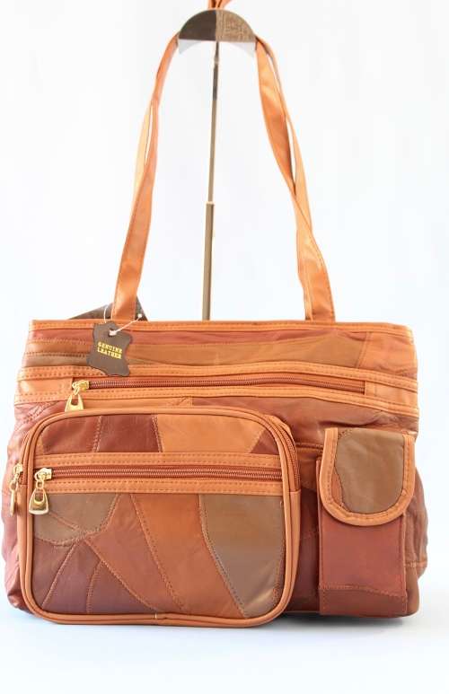 **new**LADIES GENIUNE LEATHER HAND BAG IN  A  BROWN. SIMPLY GORGEOUS!!l