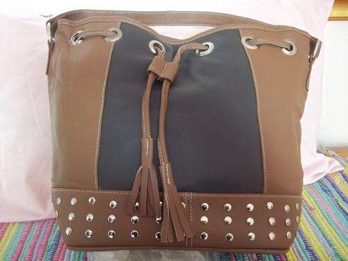 LADIES GENUINE LEATHER HAND BAG IN  A TAN WITH STUDS . SIMPLY GORGEOUS!!