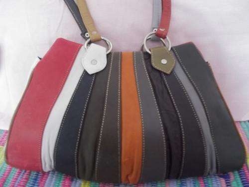 LADIES GENUINE LEATHER HAND BAG IN  A multi color . SIMPLY GORGEOUS!!