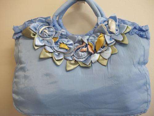 Latest colorful soft fabric handbag, with stunning rose detail. Simply Gorgeous!!