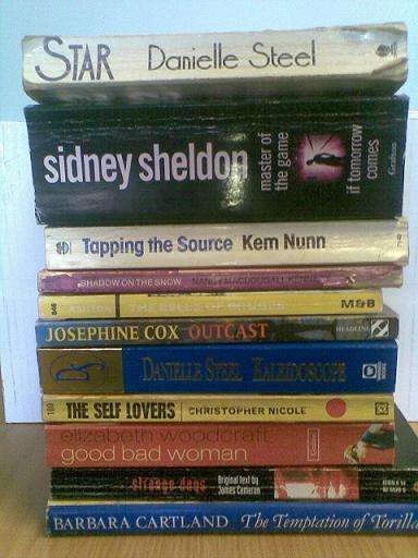 LOT OF 11  USED BOOKS STILL IN GOOD CONDITION