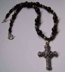 BLACK BEADED NECKLACE WITH ROPE CROSS