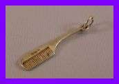VINTAGE SILVER COMB CHARM