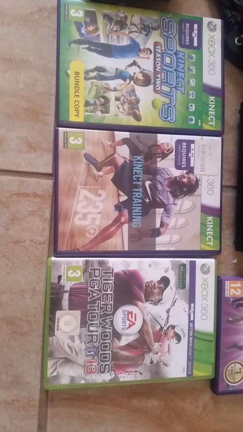 XBOX 360 , 4GB + Kinect + 4 Games + 1 Remote