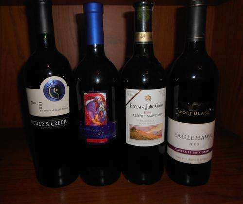 Collection of 4 assorted wines please see pictures below.