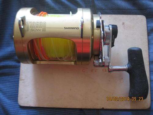 Shimano Tiagra 50W with 50pd Penn rod