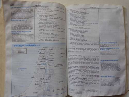 The Quest Study Bible NIV soft cover book  covered with plastic wrap - read further