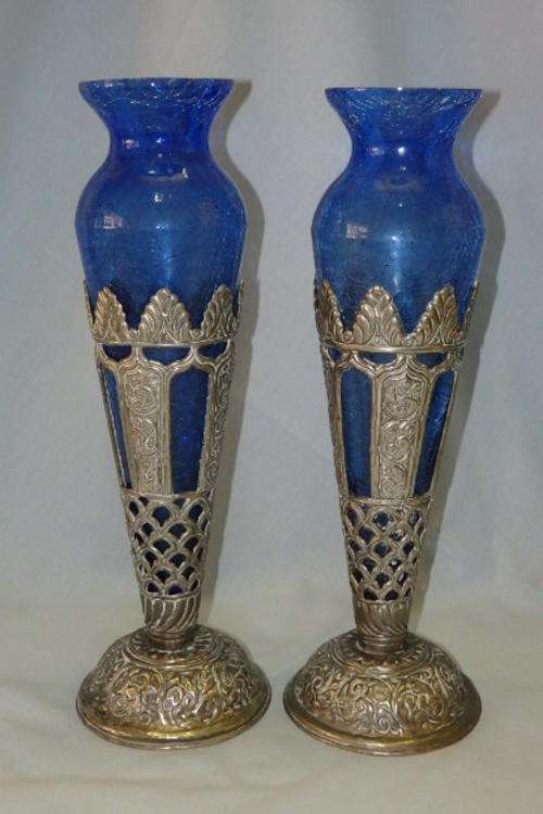 TWO STUNNING HAND BLOWN "CRAQUELE GLASS" COBALT BLUE VASES ENCASED IN HAND CHASED METAL STANDS