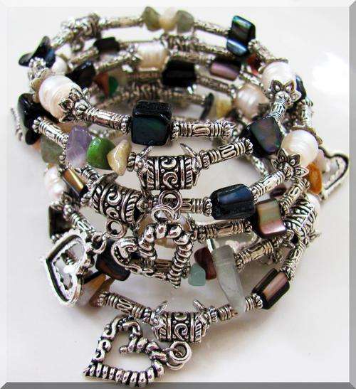 BEAUTIFUL!!! SIX STRAND CHARM BRACELET WITH TIBETAN SILVER, FRESHWATER PEARL, SHELL AND STONE