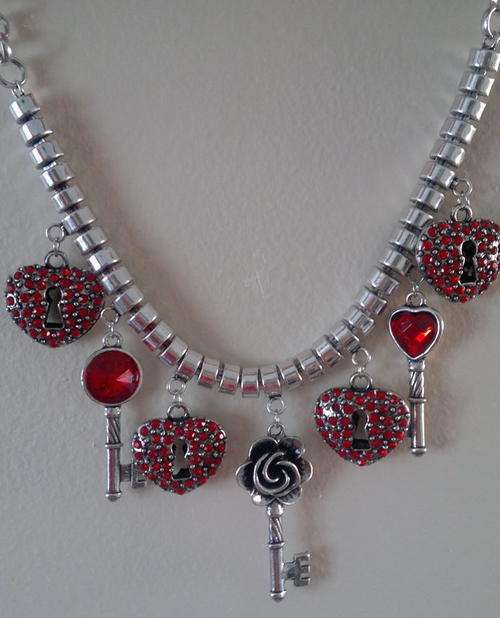 A MUST HAVE - absolute gorgeous RED charm necklace