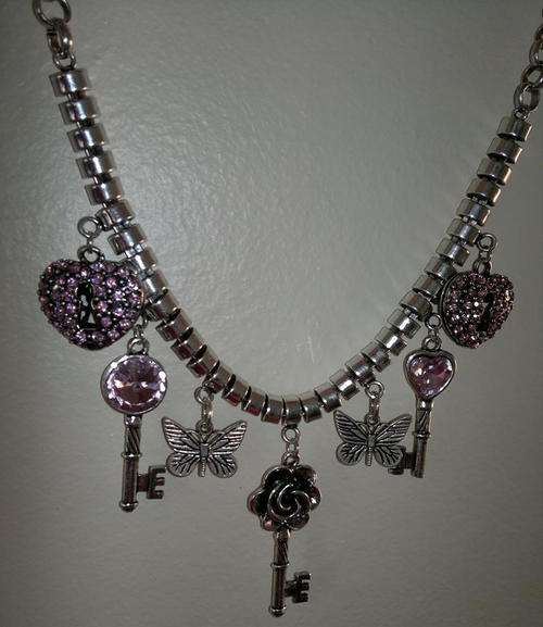 A MUST HAVE - Absolute gorgeous light pink and silver charm necklace