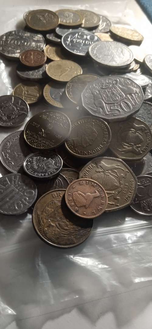 A large uninspected collection of Vintage European and what have you coins