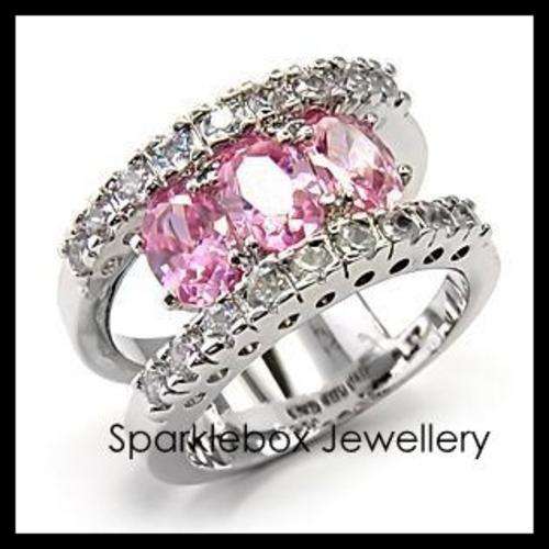 ***FANTASTIC ICE PINK SIMULATED DIAMOND BAND RING SIZE 6***