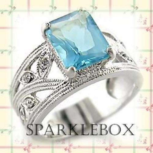 ***TRENDY PRONG SETTING AQUAMARINE SIMULATED DIAMOND BAND RING*** SIZE 6