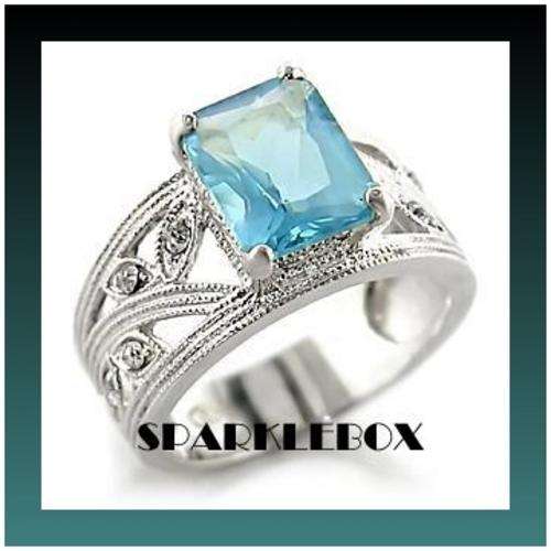 **TRENDY PRONG SETTING AQUAMARINE SIMULATED DIAMOND BAND RING**SIZE 6