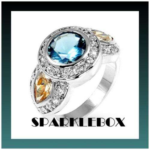 **SILVERTONE AQUAMARINE & CHAMPAGNE COCKTAIL CZ RING**SIZE 8