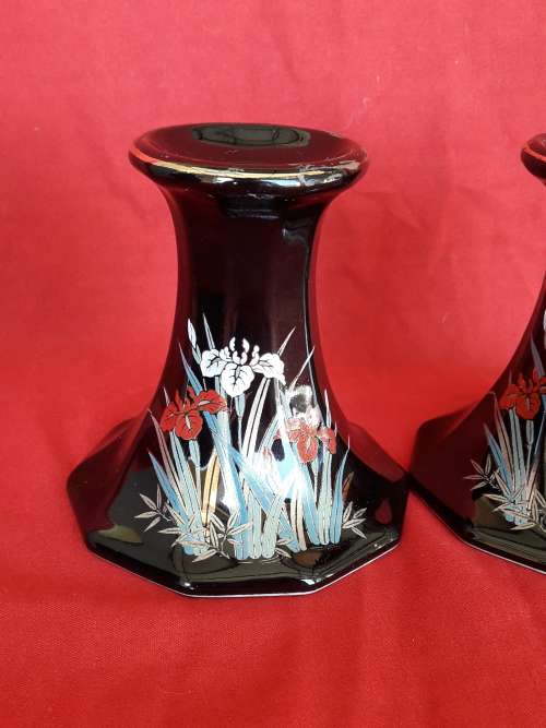 A beautiful decorative ginger jar and candlestick holder set