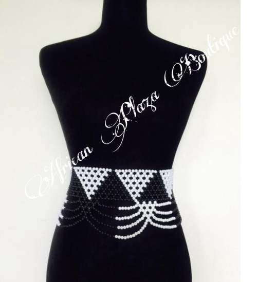 Women`s black and white Traditional Zulu Skirt and Beaded Belt. Pleated Zulu women skirt