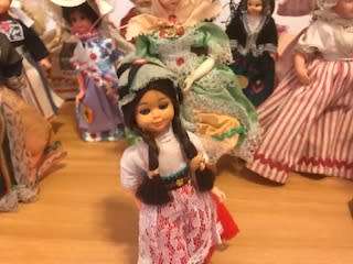 SIXTEEN VINTAGE INTERNATIONAL SOUVENIR DOLLS