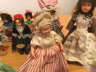SIXTEEN VINTAGE INTERNATIONAL SOUVENIR DOLLS