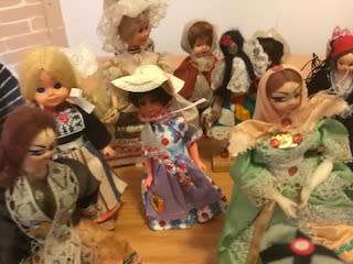 SIXTEEN VINTAGE INTERNATIONAL SOUVENIR DOLLS