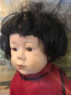 TWO PRETTY ORIENTAL PORCELAIN BOY AND GIRL DOLLS-46 CM HIGH