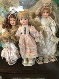 FOUR VERY ARTISTIC PORCELAIN LADIES FOR ONE BID-ONE WITH CERTIFICATE (COA)