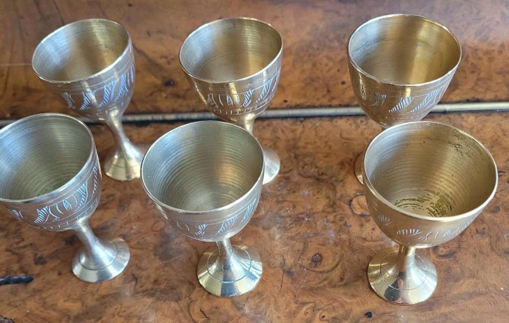 Miniature arty solid brass decanter and six small goblets. on its own tray Very beautifully crafted