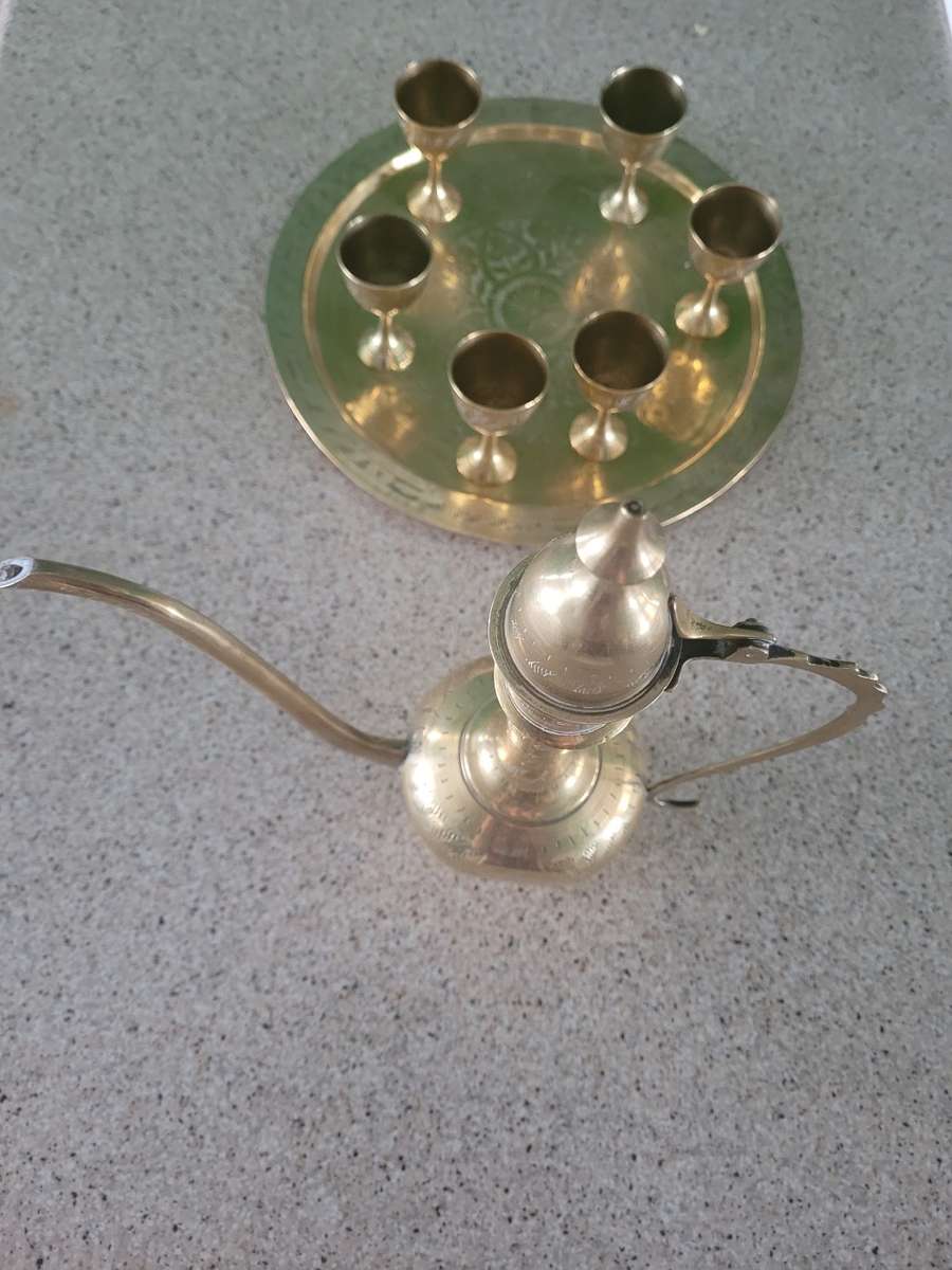 Miniature arty solid brass decanter and six small goblets. on its own tray Very beautifully crafted