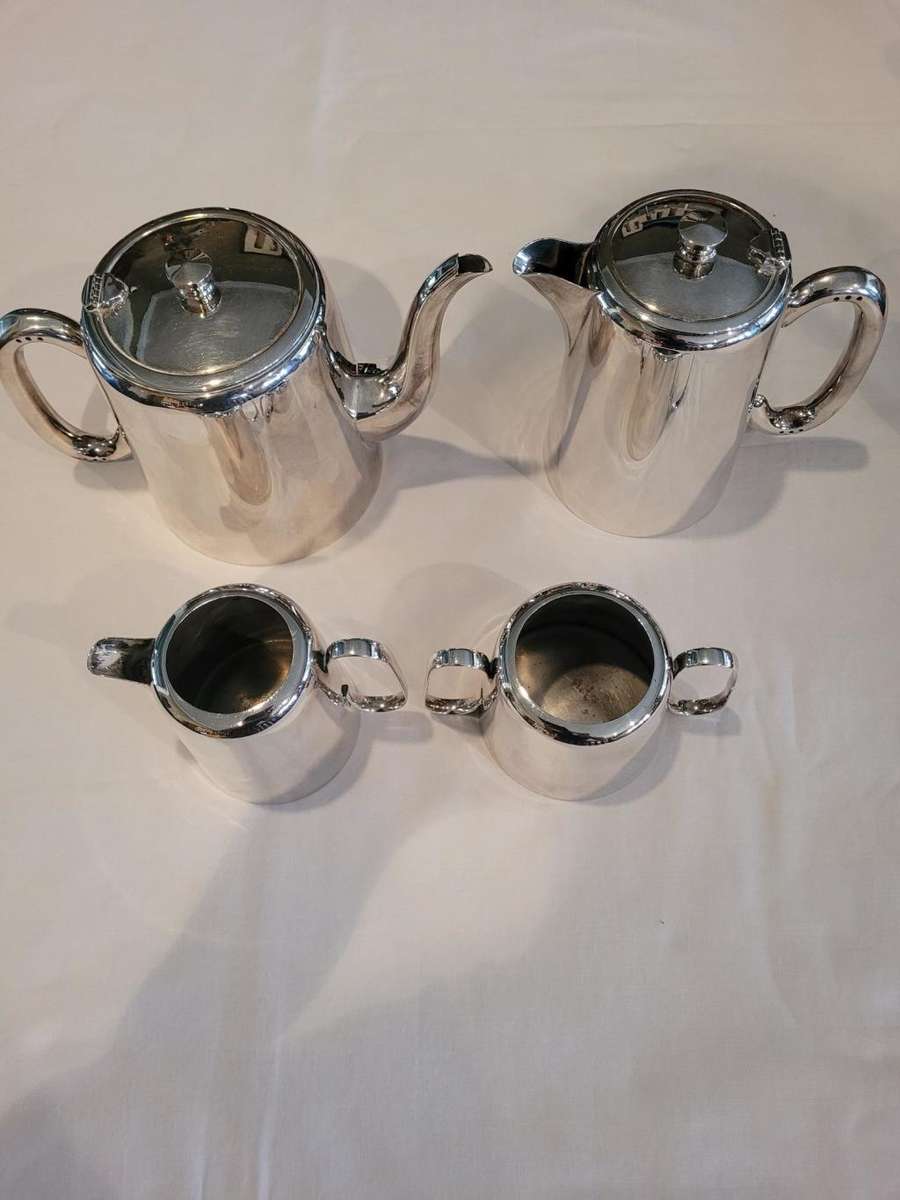 Hotel tea and coffee serving set-silver plated four piece set. Shiny and worthy of occasions