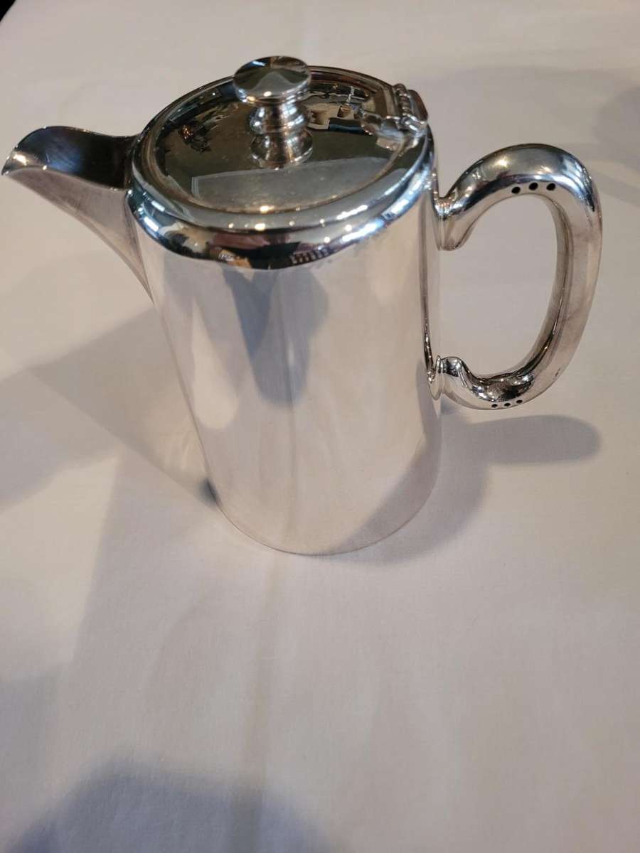 Hotel tea and coffee serving set-silver plated four piece set. Shiny and worthy of occasions
